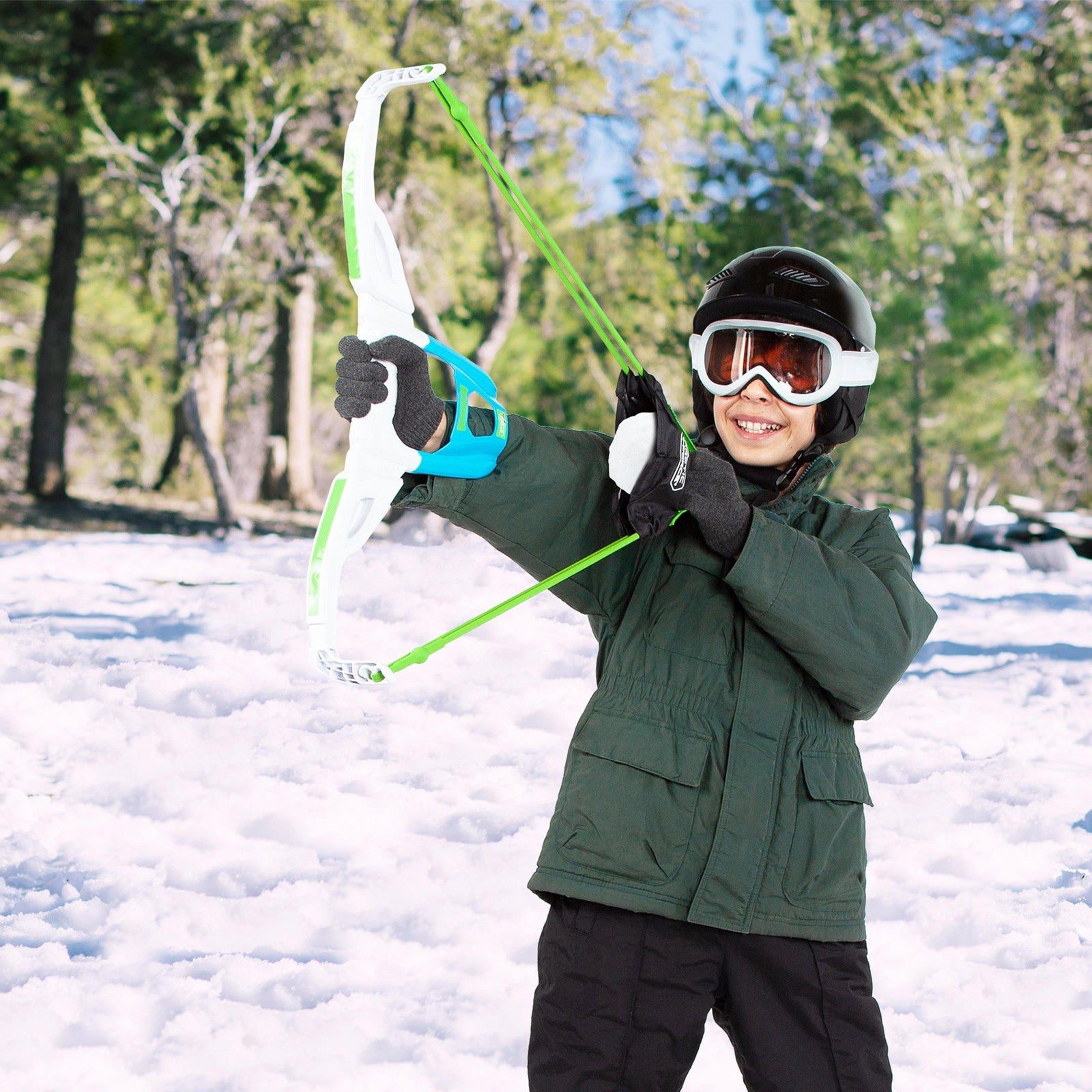 Child aiming an Arctic Force snow bow in the snow