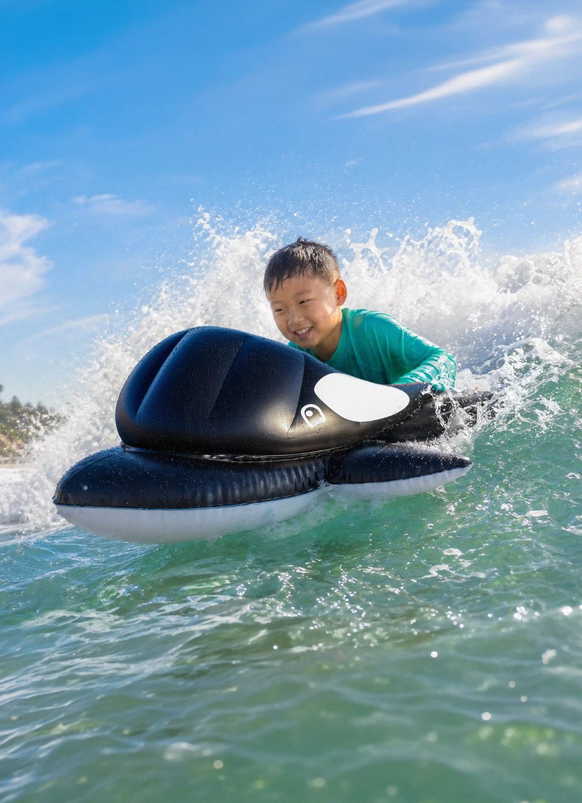 Child riding the Boogie Board Orca Wave Catcher in the surf
