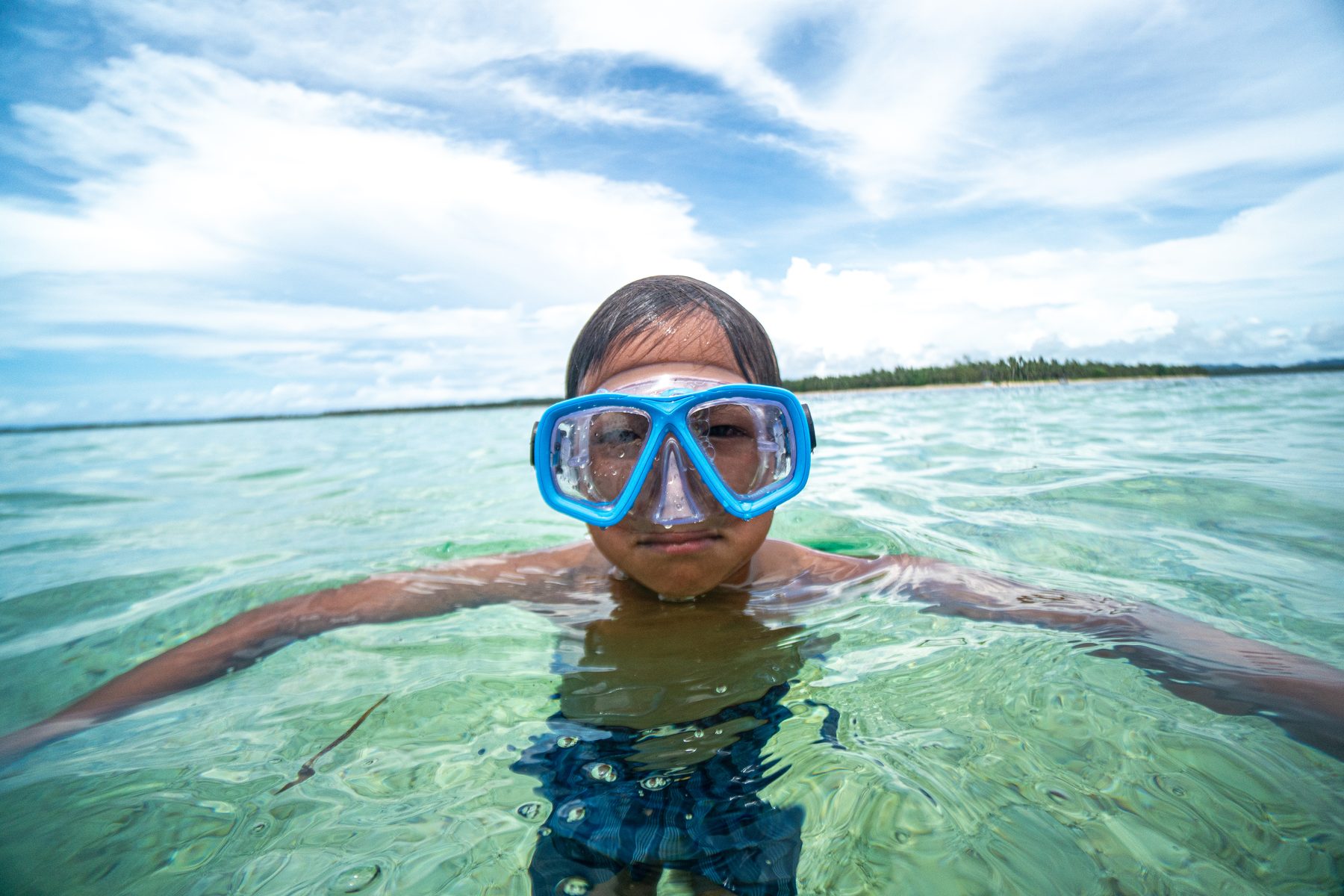 Child snorkelling in a Sea-Doo mask