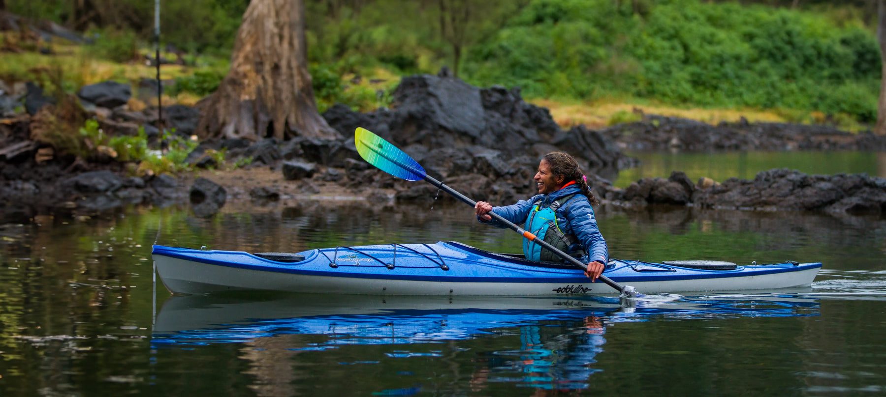 Paddler in a Stohlquist PFD